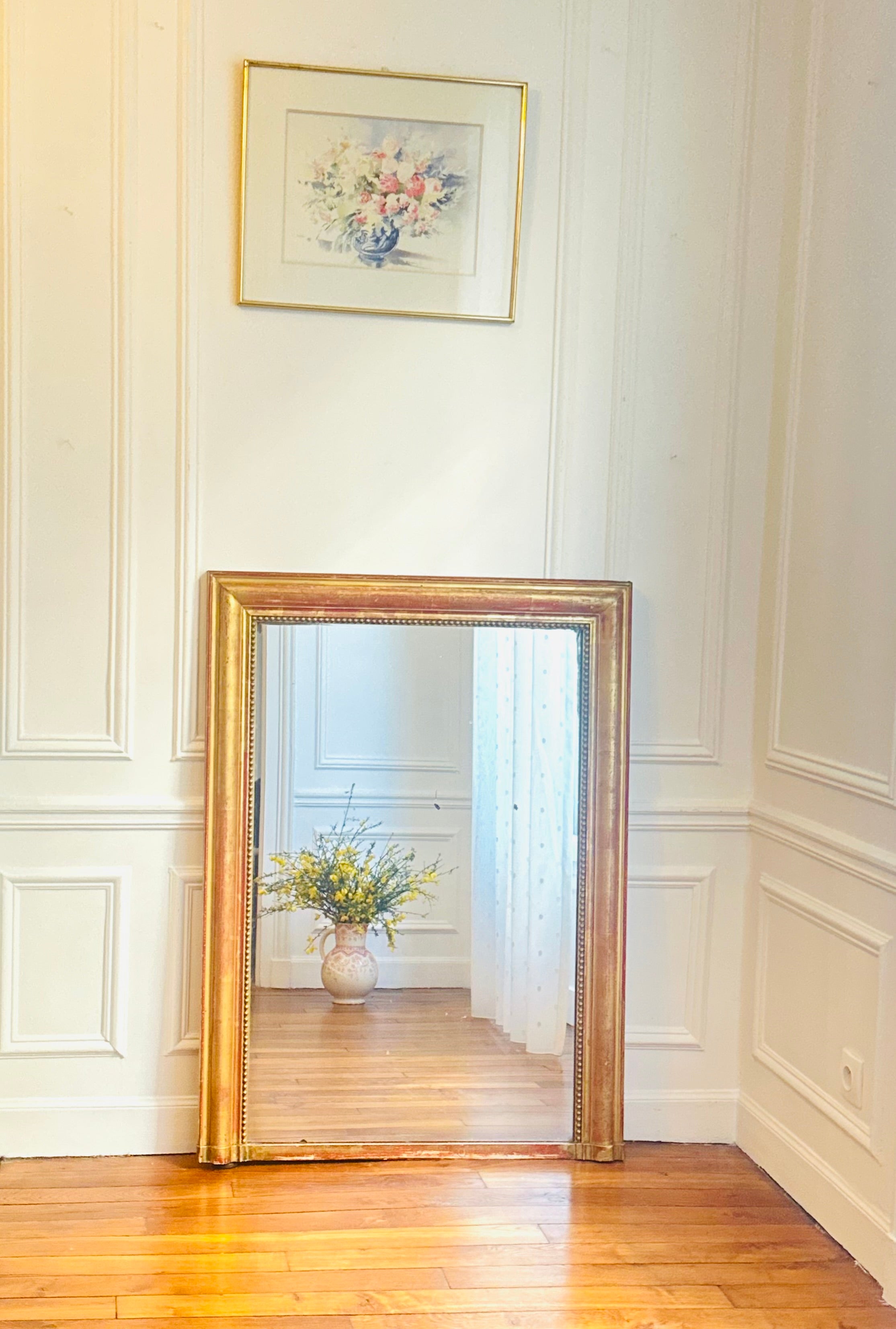 Miroir Louis XVI à la feuille d’or