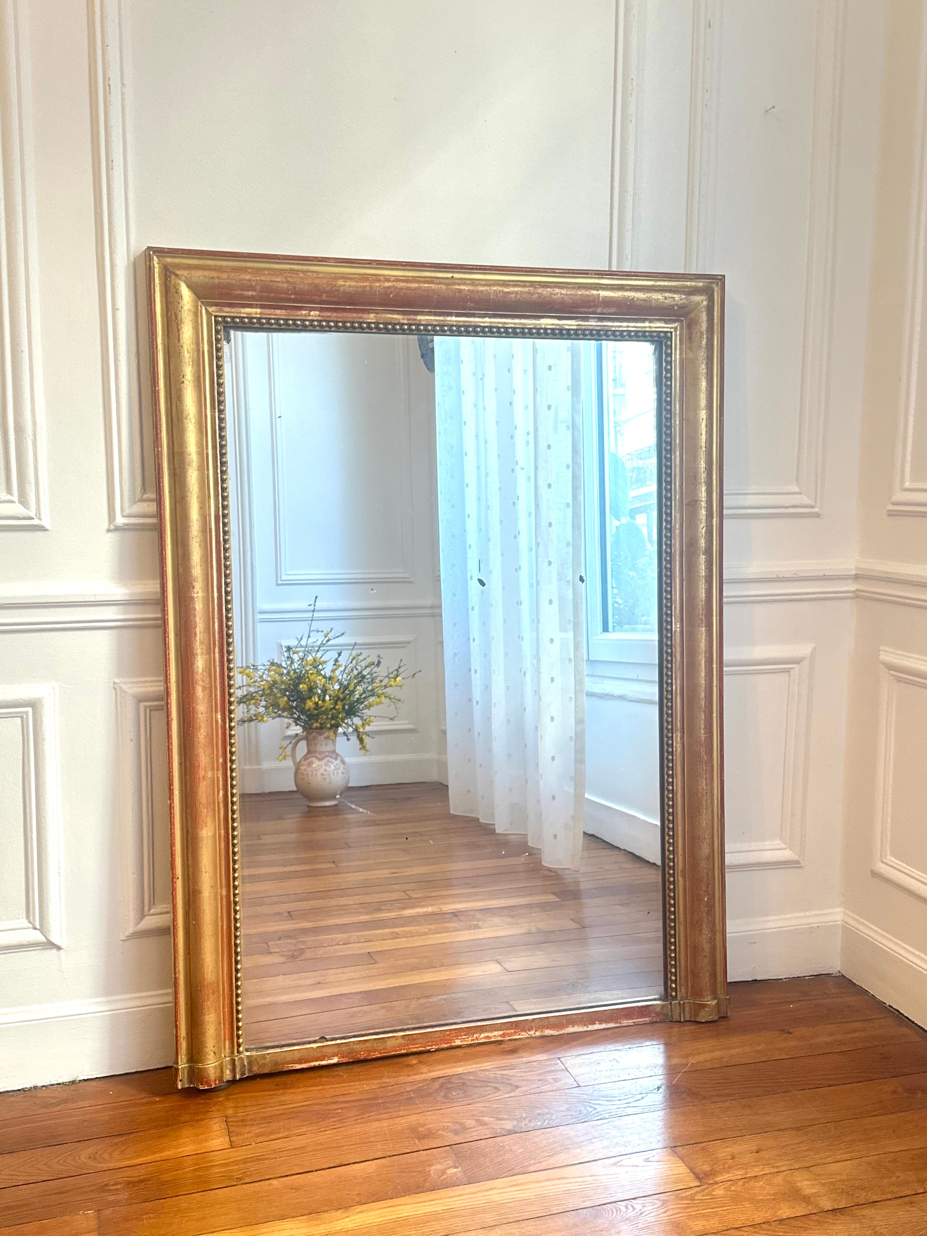 Miroir Louis XVI à la feuille d’or