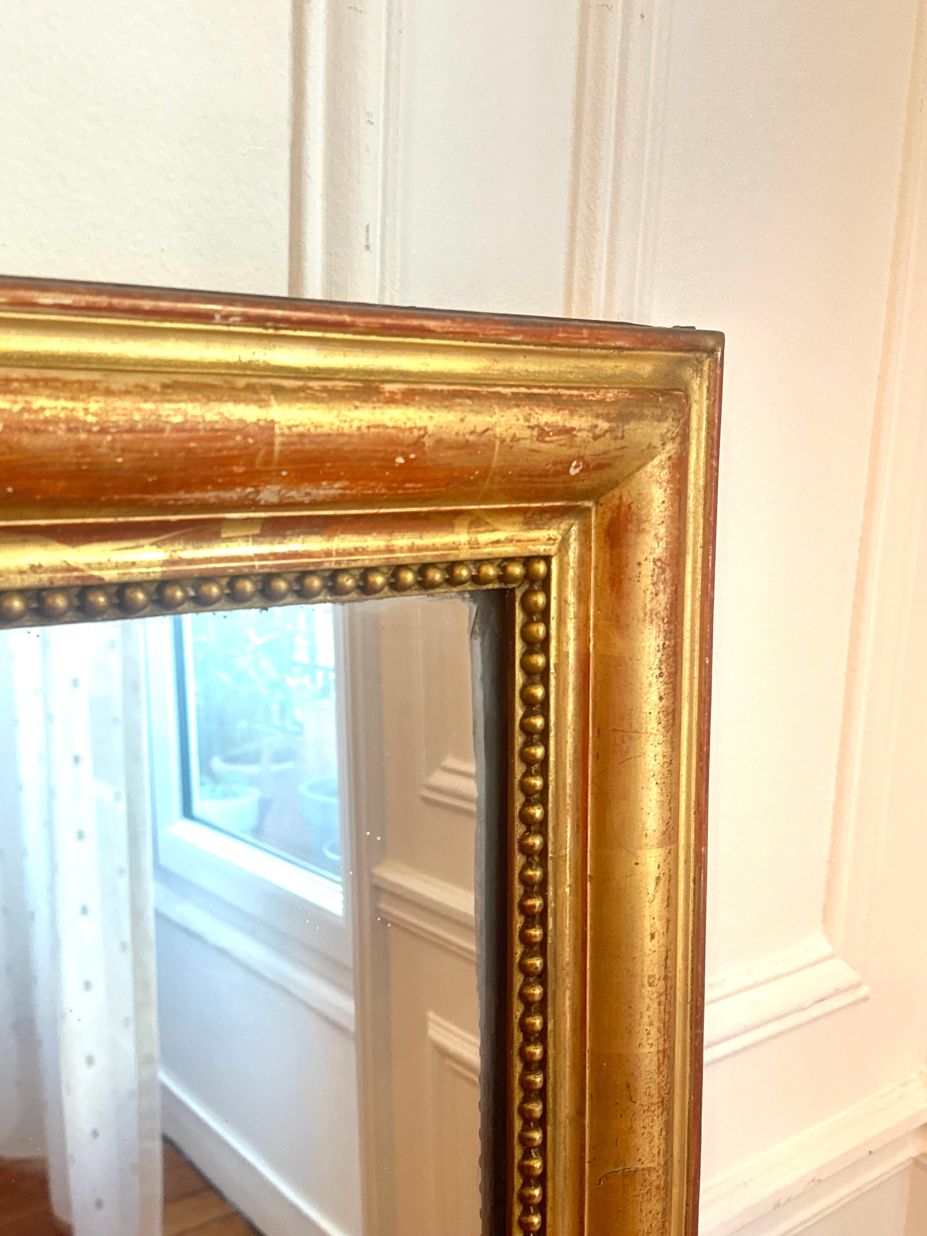 Miroir Louis XVI à la feuille d’or