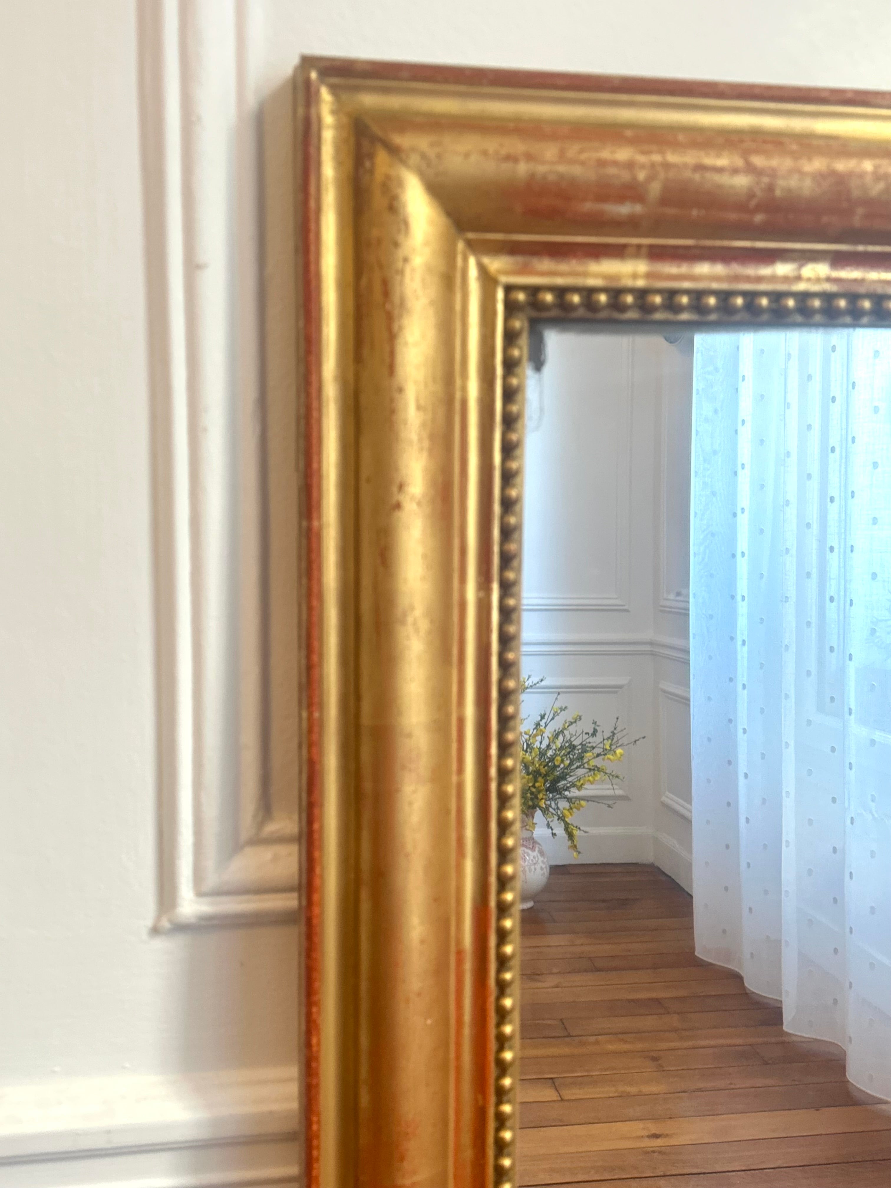 Miroir Louis XVI à la feuille d’or