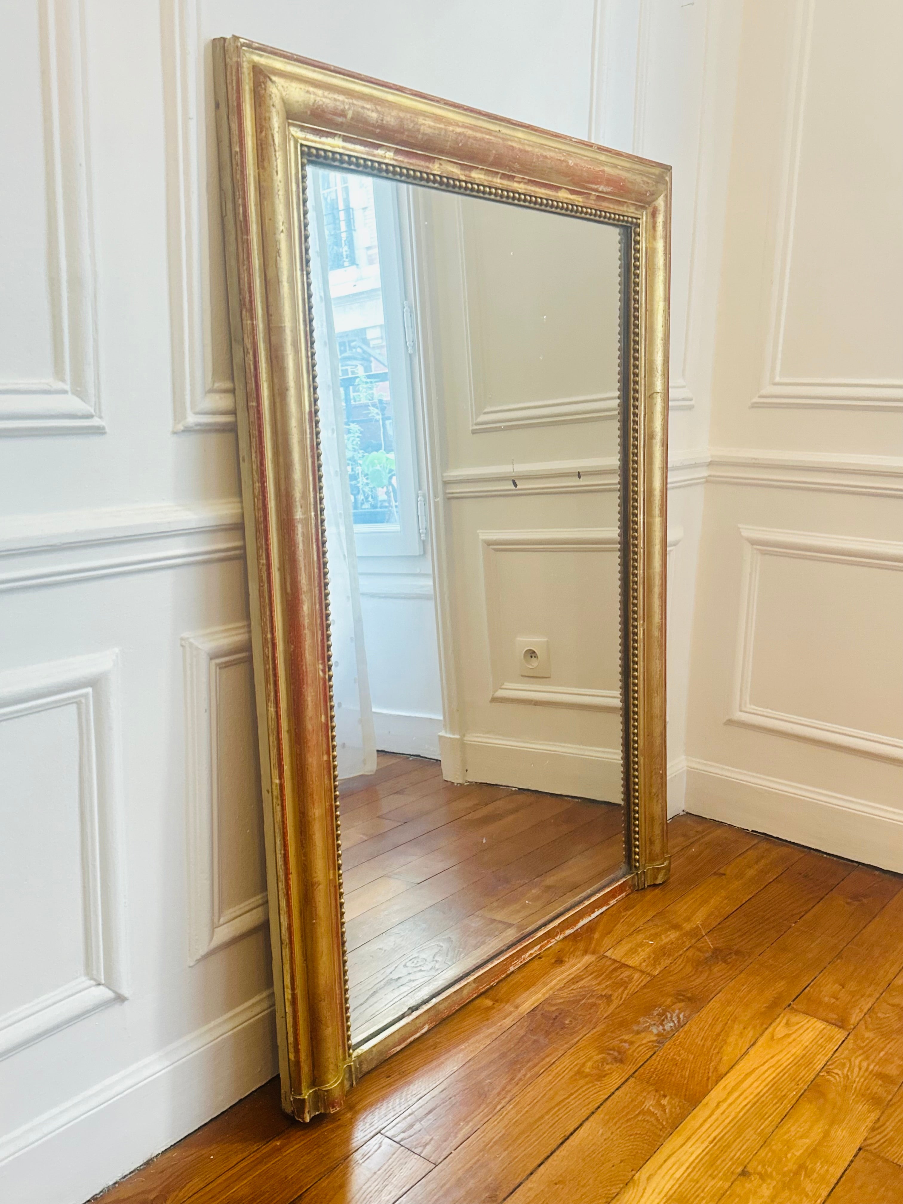 Miroir Louis XVI à la feuille d’or